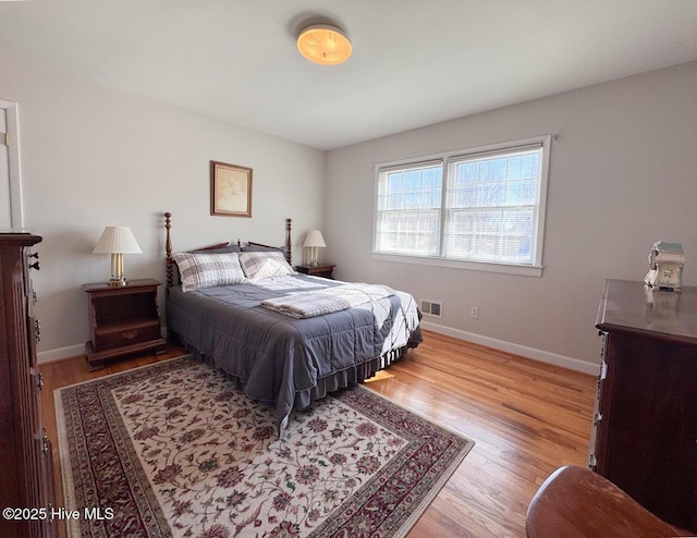 bedroom with light hardwood / wood-style floors