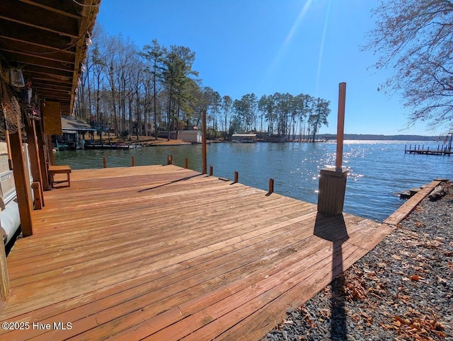 view of dock with a water view