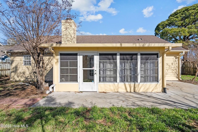 back of property featuring a patio area