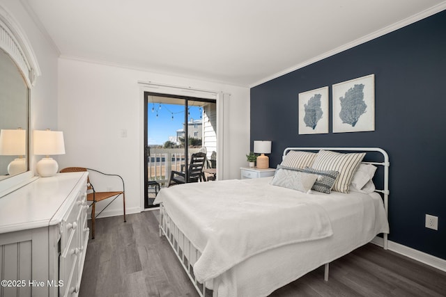 bedroom featuring access to outside, crown molding, baseboards, and wood finished floors