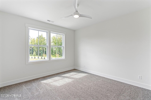 carpeted empty room with ceiling fan