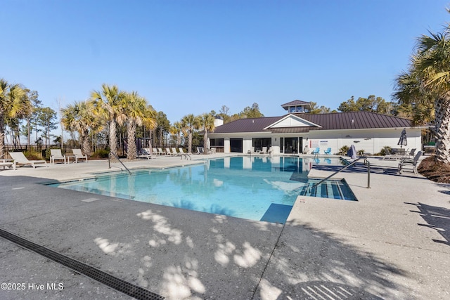 view of pool featuring a patio area