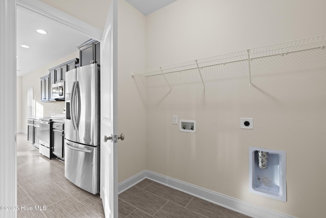 clothes washing area featuring washer hookup and hookup for an electric dryer