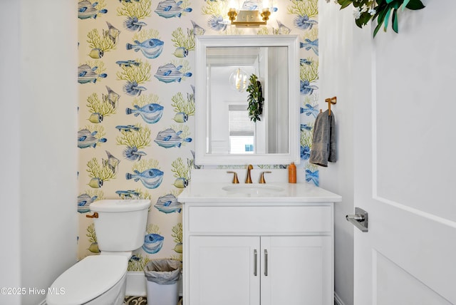 740 Waterstone Dr, Wilmington, NC 28411 - half bathroom with toilet, vanity, and wallpapered walls