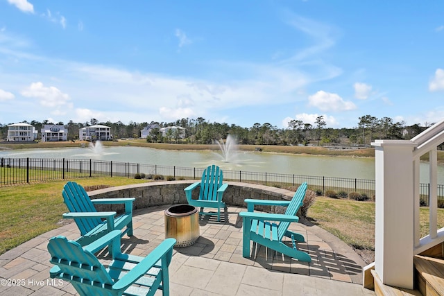 740 Waterstone Dr, Wilmington, NC 28411 - view of patio / terrace with a water view and a fire pit