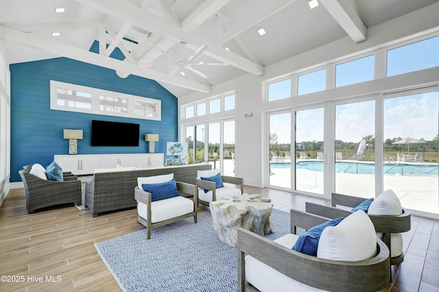 740 Waterstone Dr, Wilmington, NC 28411 - living room with high vaulted ceiling, beam ceiling, light wood-style flooring, and ceiling fan
