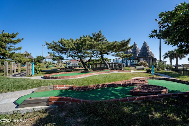 view of home's community featuring a lawn