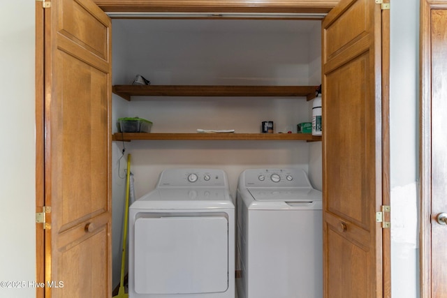 laundry room featuring laundry area and separate washer and dryer