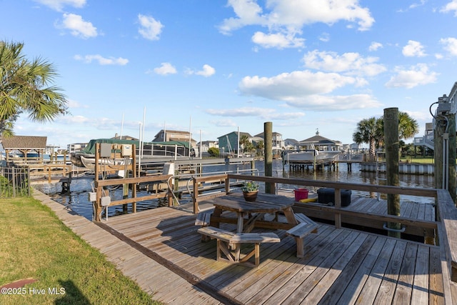 view of dock featuring a water view and boat lift