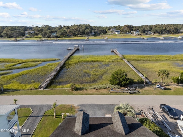 birds eye view of property featuring a water view