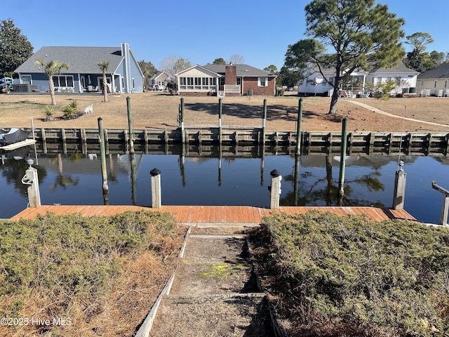 dock area featuring a water view