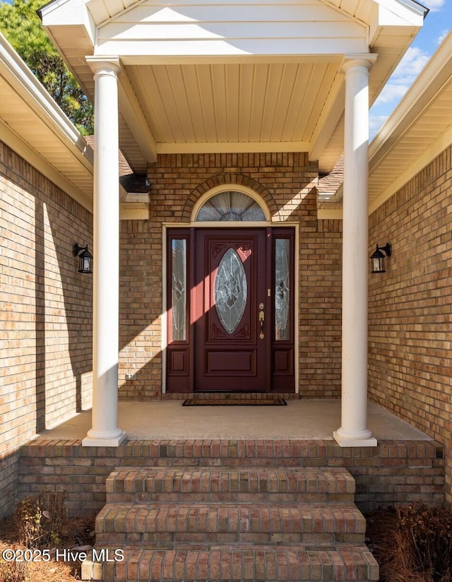 doorway to property with covered porch