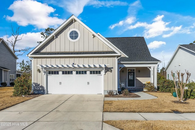 view of front of house featuring a garage and covered porch