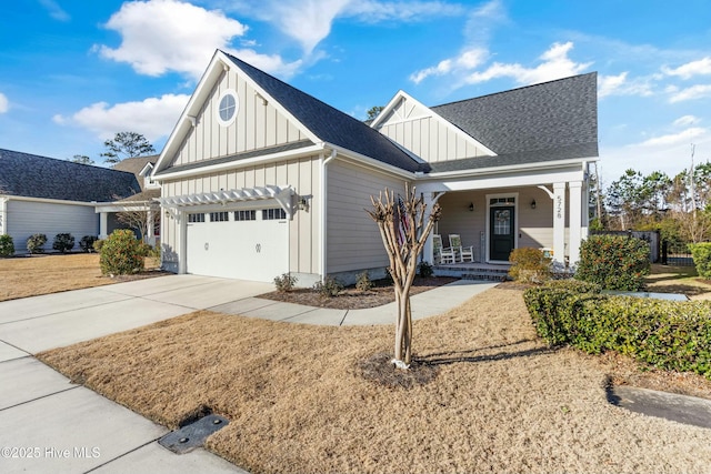 view of front facade featuring a garage and a porch