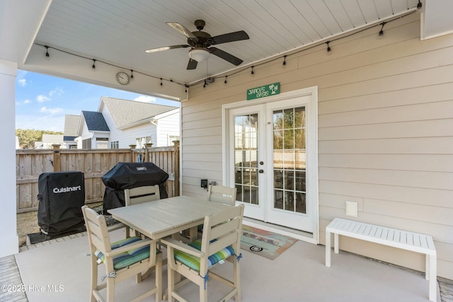 view of patio / terrace with grilling area, french doors, and ceiling fan