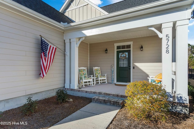 doorway to property with a porch