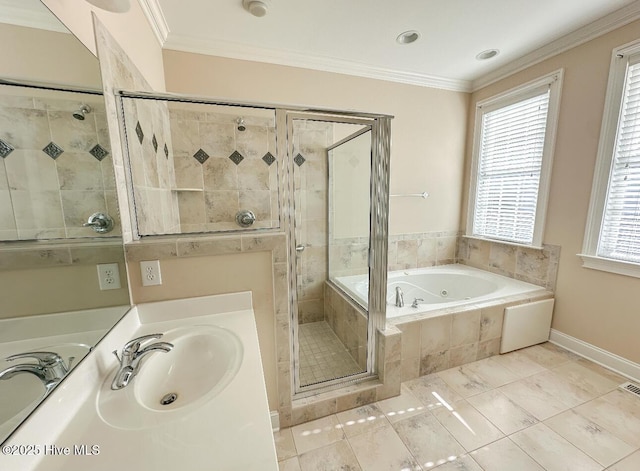 bathroom featuring crown molding, plus walk in shower, and sink