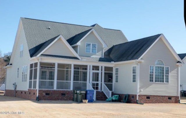 back of property featuring a sunroom