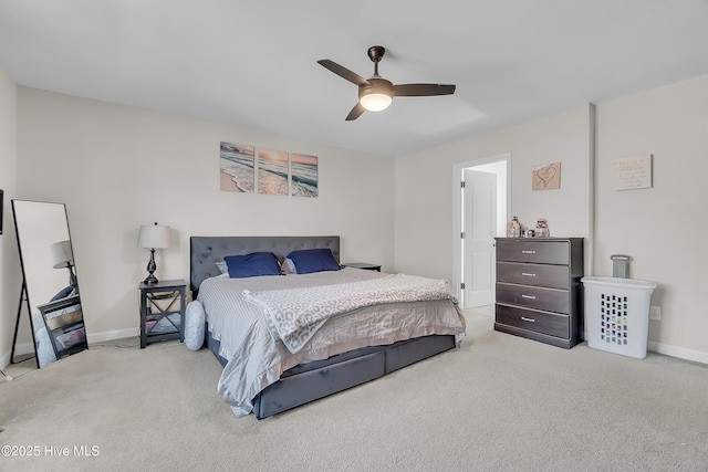 bedroom featuring ceiling fan and light colored carpet