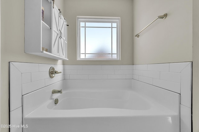 bathroom with a bathing tub