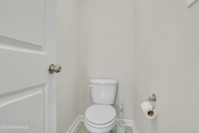 bathroom featuring tile patterned floors and toilet