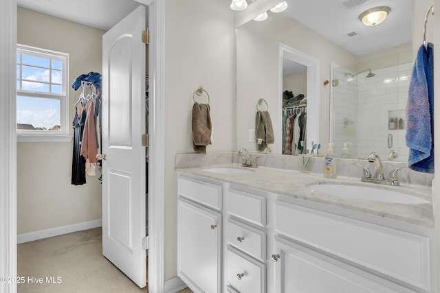 bathroom with vanity and walk in shower