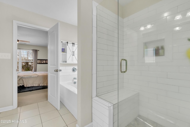 bathroom featuring walk in shower and tile patterned flooring