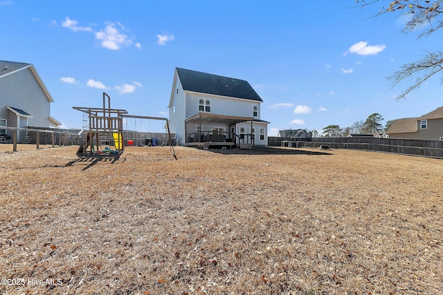 view of yard with a playground