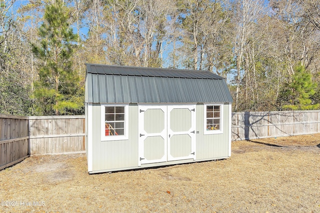 view of outdoor structure featuring a yard