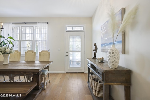 doorway to outside featuring light hardwood / wood-style floors