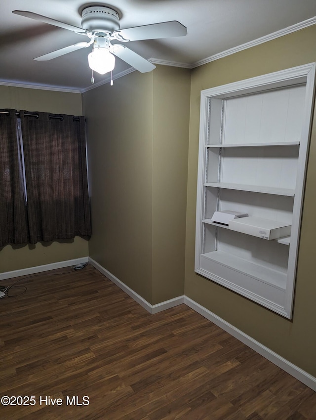 unfurnished room with crown molding, ceiling fan, and dark hardwood / wood-style flooring