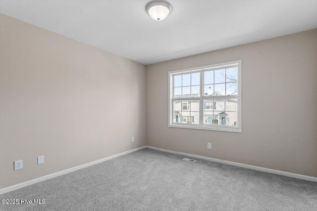 empty room featuring carpet