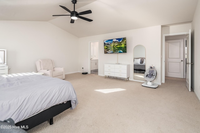 bedroom featuring lofted ceiling, light carpet, ceiling fan, and ensuite bathroom