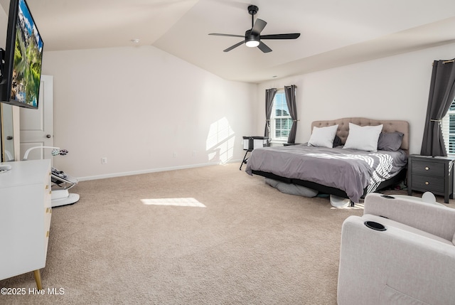 carpeted bedroom featuring lofted ceiling and ceiling fan