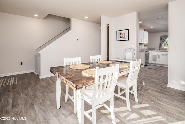 dining room featuring hardwood / wood-style floors