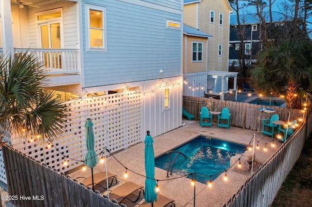 view of swimming pool featuring a patio