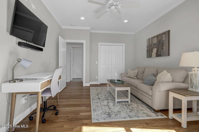 office featuring ceiling fan, recessed lighting, wood finished floors, baseboards, and ornamental molding