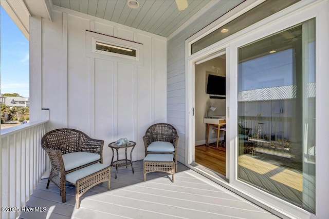 balcony featuring a sunroom