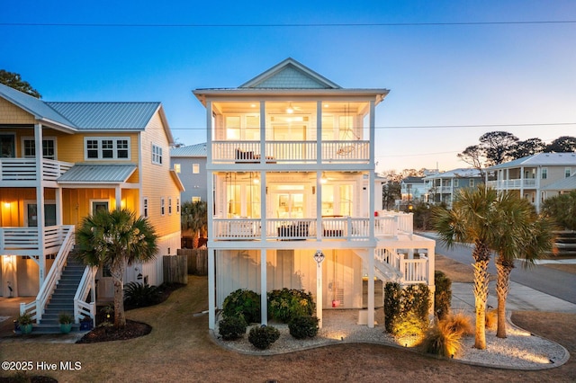 view of front of house with a balcony