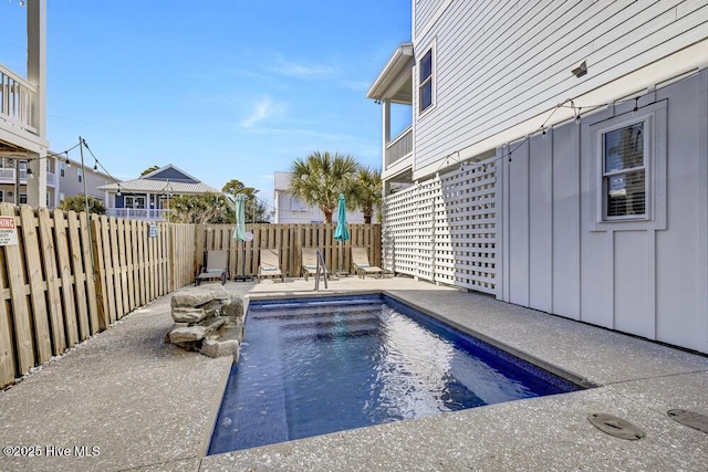 view of pool featuring a fenced backyard and a fenced in pool