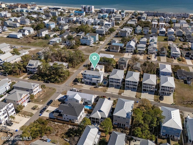 aerial view featuring a water view and a residential view