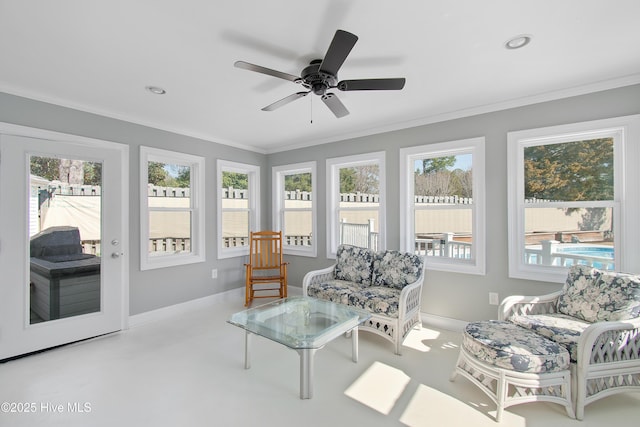 sunroom with ceiling fan