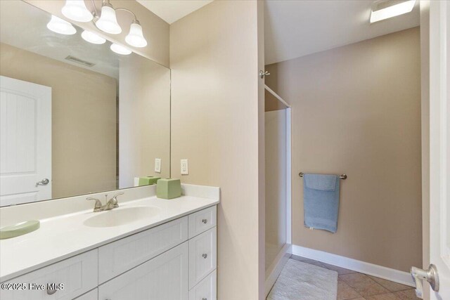 2368 Bayshore Dr SW, Supply, NC 28462 - bedroom featuring a closet, baseboards, light wood-style floors, visible vents, and ceiling fan