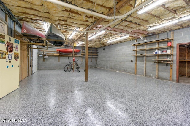 basement with white refrigerator