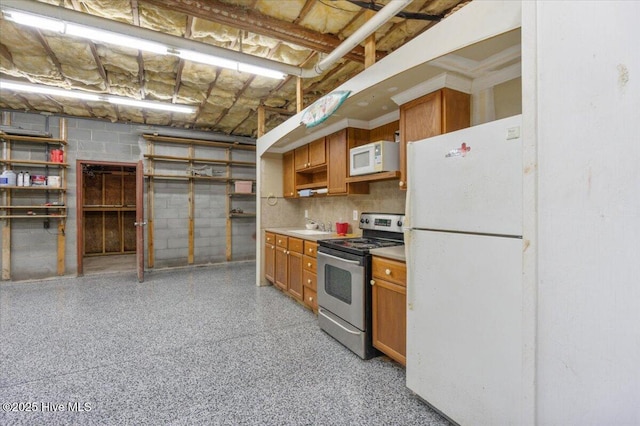 kitchen with white appliances and sink