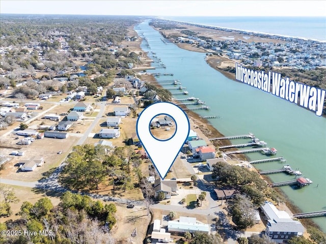 drone / aerial view featuring a water view