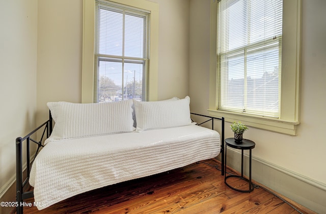 sitting room with hardwood / wood-style floors