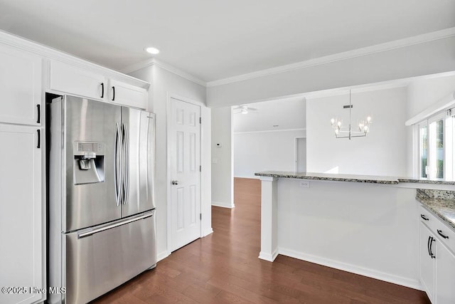 kitchen with white cabinets, stainless steel refrigerator with ice dispenser, dark hardwood / wood-style floors, and light stone counters