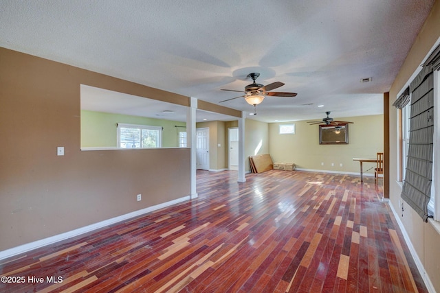 interior space featuring hardwood / wood-style floors and a textured ceiling