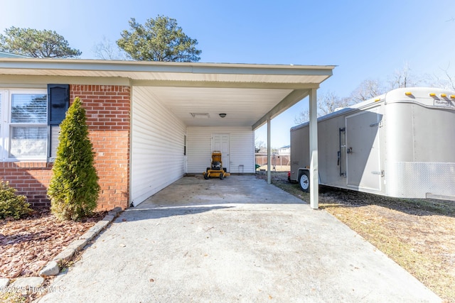 view of vehicle parking with a carport